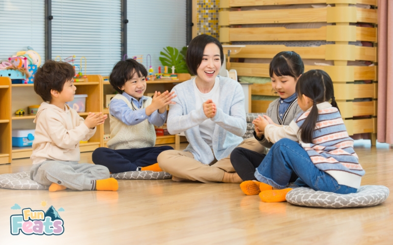 teacher playing with her students