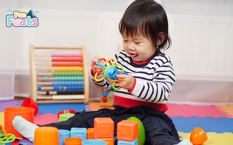 Preschooler playing with sensory toys during emotional development activities