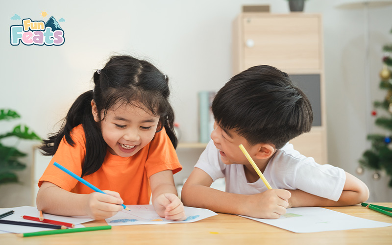 Two kids having fun drawing